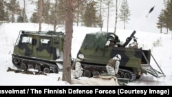 The heavy mortar mounted inside a trailer for the Finnish-made “piglet” tracked vehicle allows a firing crew to lob a dozen mortar rounds in a minute, then escape into the wilderness before an adversary's battery radars can pinpoint their location.