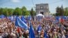 People take part in a pro-EU rally in Chisinau on May 21.