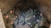 A group of Russian soldiers who refused to take part in hostilities are pictured in a cellar in Ukraine's Donetsk region in December 2022.