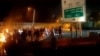 A video posted on social media on October 15 purportedly shows Iranian protesters gathered on a road leading to Evin prison, northwest of Tehran, where a fire broke out over the weekend amid reports of an uprising.