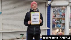 Kamil Churayev staging a one-man picket against the war in Ukraine.