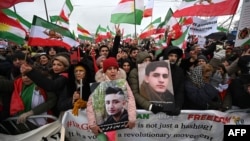 People take part in a rally against the Iranian regime in front of the European Parliament in Strasbourg, France, on January 16.