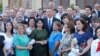 Azerbaijani President Ilham Aliyev meets with journalists at the inauguration ceremony for the new apartment building in Baku.