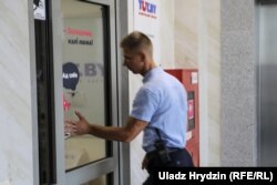 Investigative Committee officers arrive to search the Tut.by offices in Minsk on August 7.