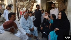 Sanam Faqeer (right), a transgender candidate in Pakistan's May 11 elections, says candidates lack resources, have little grassroots support, and must contend with widespread misinformation about the group in Pakistani society.