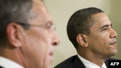 U.S. President Barack Obama (right) meets with Russian Foreign Minister Sergei Lavrov in the White House's Oval Office on May 7.