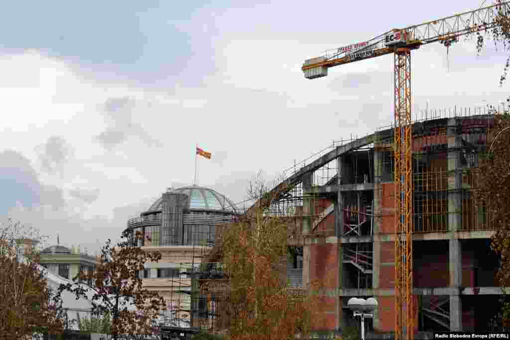 A new concert hall is under construction (right) next to the newly completed offices of the public prosecutor and financial police (center).