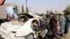 AFGHANISTAN -- Afghan security officials inspect the scene of a IED blast in Lashkar Gah, the provincial capital of Helmand, November 12, 2020