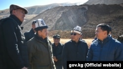 Kyrgyz Energy Minister Doskul Bekmurzaev (second from right) is shown inspecting the Kara-Keche coal mine in the Naryn region in October 2021.
