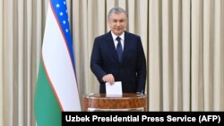 Uzbek President Shavkat Mirziyoev casts his vote in the presidential election on October 24.