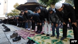 Muslims offer Eid al-Adha prayers at the central Gazi-Husref Bey Mosque in Sarajevo in October 2012.