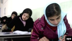 Many Afghan girls have returned to school since the fall of the Taliban -- but old attitudes persist about women's roles.