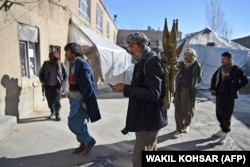 Ethnic Hazara militants prepare for a patrol against the Taliban in Afghanistan’s Wardak Province in January 2021.