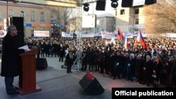 Armenian President Serzh Sarkisian (left) addresses an election campaign rally in Ararat on February 4. The election is widely seen as Sarkisian's to lose.