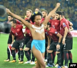 Diash protested against Turkish President Recep Tayyip Erdogan at a World Cup qualifying football match in Kharkiv, Ukraine, in September, a move that received widespread media attention.