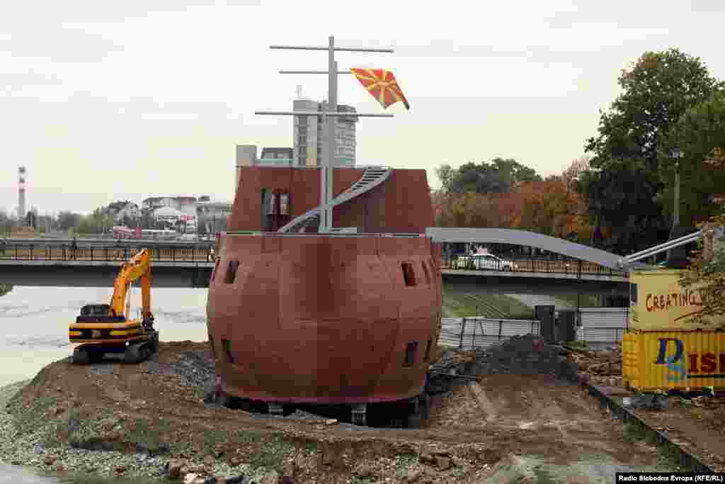 One of two structures in the shape of a galley ship on the banks of the Vardar River. Macedonia&#39;s government has said that the cost of the Skopje 2014 project is 208 million euros, but the political opposition claims that the real cost could be close to twice the official figure.