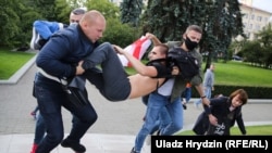 Nearly 130 protesters were detained in Minsk during July 14 demonstrations against the disqualification of presidential candidates.
