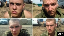 Handout pictures released by the Ukrainian Security Service (SBU) press service on August 26 purportedly show Russian paratroopers captured by Ukrainian forces near the village of Dzerkalne, in the Donetsk region.