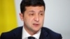 Ukraine's President Volodymyr Zelenskiy speaks during a press conference after the Paris summit. Activists in Ukraine says Zelenskiy crossed no “red lines” in his talks with Putin.