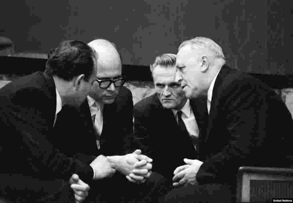 Mario Garcia-Inchaustegui, Cuba&#39;s ambassador to the UN, seen here (second from left) conferring with Soviet Ambassador Valerian Zorin (right), seeks a Security Council debate on the blockade, which he calls an &quot;act of war unilaterally committed&quot; by the U.S.