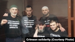 Five defendants from the widely criticized"25 Case" in court in Simferopol last year: Shaban Umerov (left), Raim Aivazov (second left), Riza Izetov (center), Farhod Bazarov (second from right), and Remzi Bekirov. 