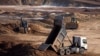 Machines extracting the rare earth mineral ilmenite from an open pit mine in Ukraine's central Kirovohrad region. 