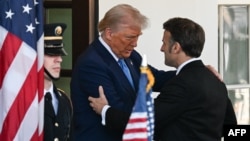 U.S. President Donald Trump welcomes French President Emmanuel Macron to the White House in Washington, D.C., on February 24.