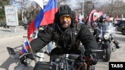 Aleksandr Zaldostanov, the leader of the Night Wolves biker group, takes part in a commemoration ceremony for soldiers killed during World War II memorial in Sevastopol, Crimea, in March.