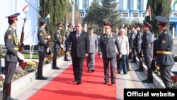 Tajik President Emomali Rahmon (left) attends ceremonies with Interior Minister Ramazon Rahimzoda in Dushanbe on November 10.