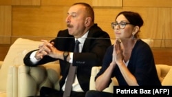 Azerbaijani President Ilham Aliyev (left) and his wife, Vice President Mehriban Aliyeva, attend the taekwondo finals at the Baku 2017 4th Islamic Solidarity Games at the Baku Sports Hall in Baku in May.