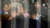 Evacuees from Afghanistan wait to fly to the United States or another safe location in a makeshift departure gate inside a hanger at the United States Air Base in Ramstein, Germany. (file photo)