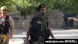 Arayik Khandoyan is pictured inside the occupied police station in Yerevan in July.