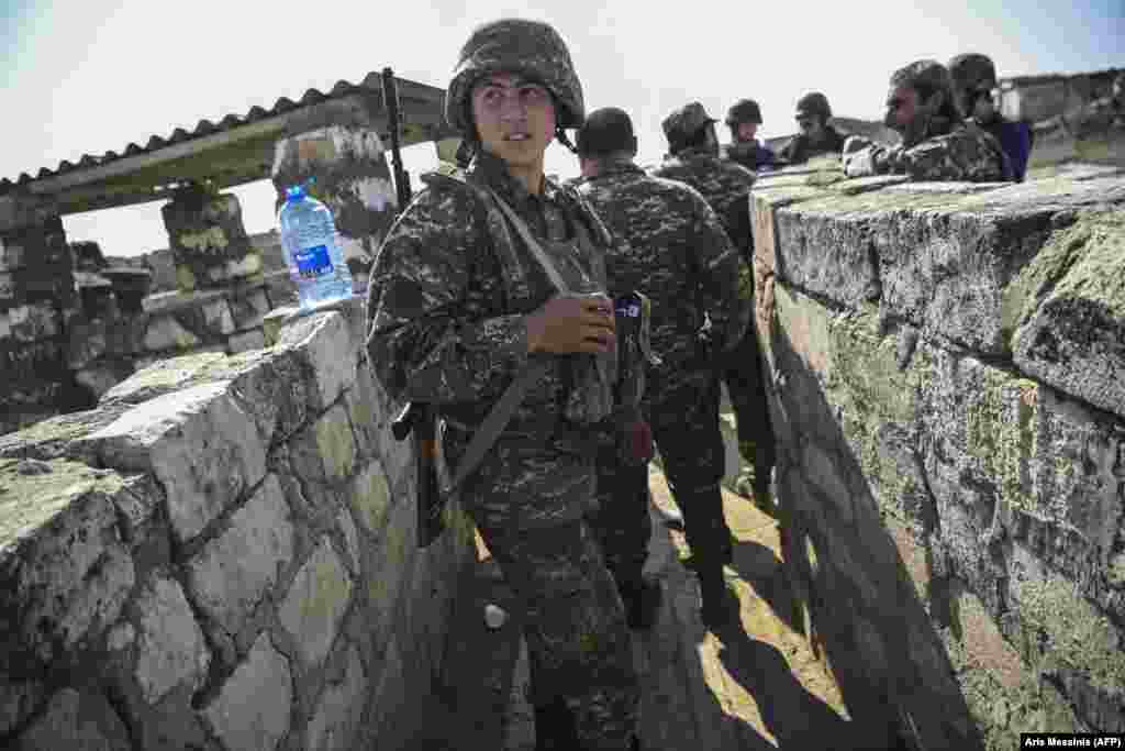 An Armenian soldier on the front line as troops fight to hold positions on October 18. &nbsp;